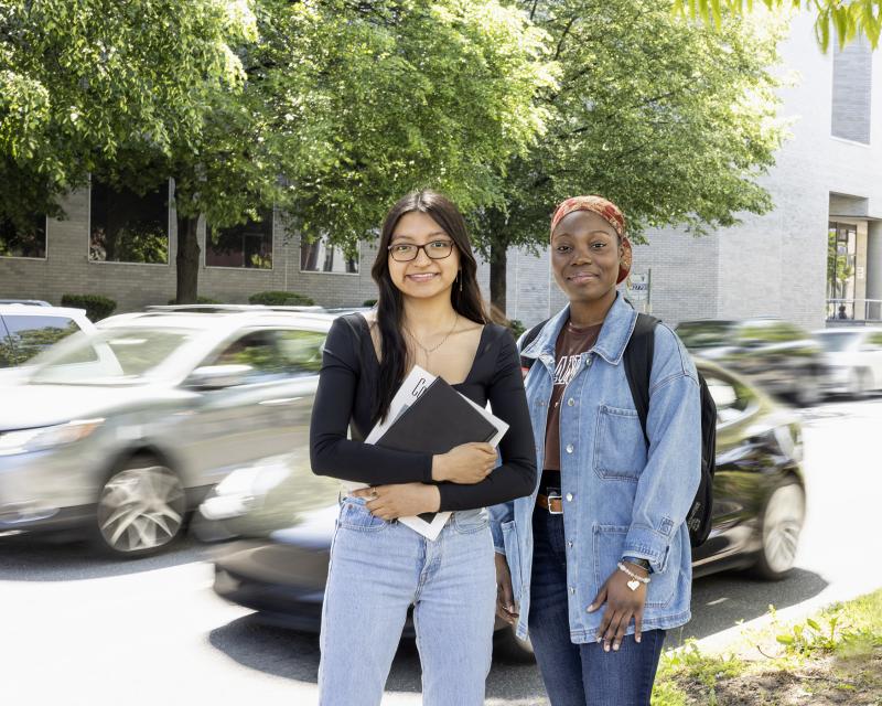Two students smiling on main campus