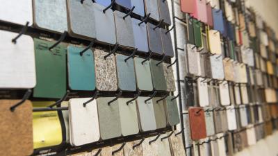 A wide array of texture and color swatches on a wall.
