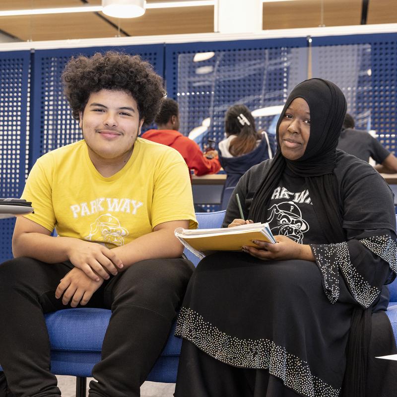 Highschool students sitting in the library